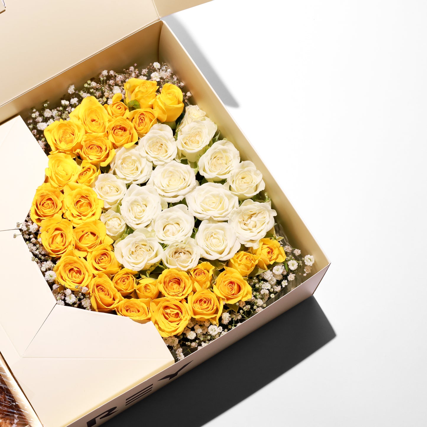 Flourey Beige Box with Yellow Roses & Gourmet Stuffed Dates